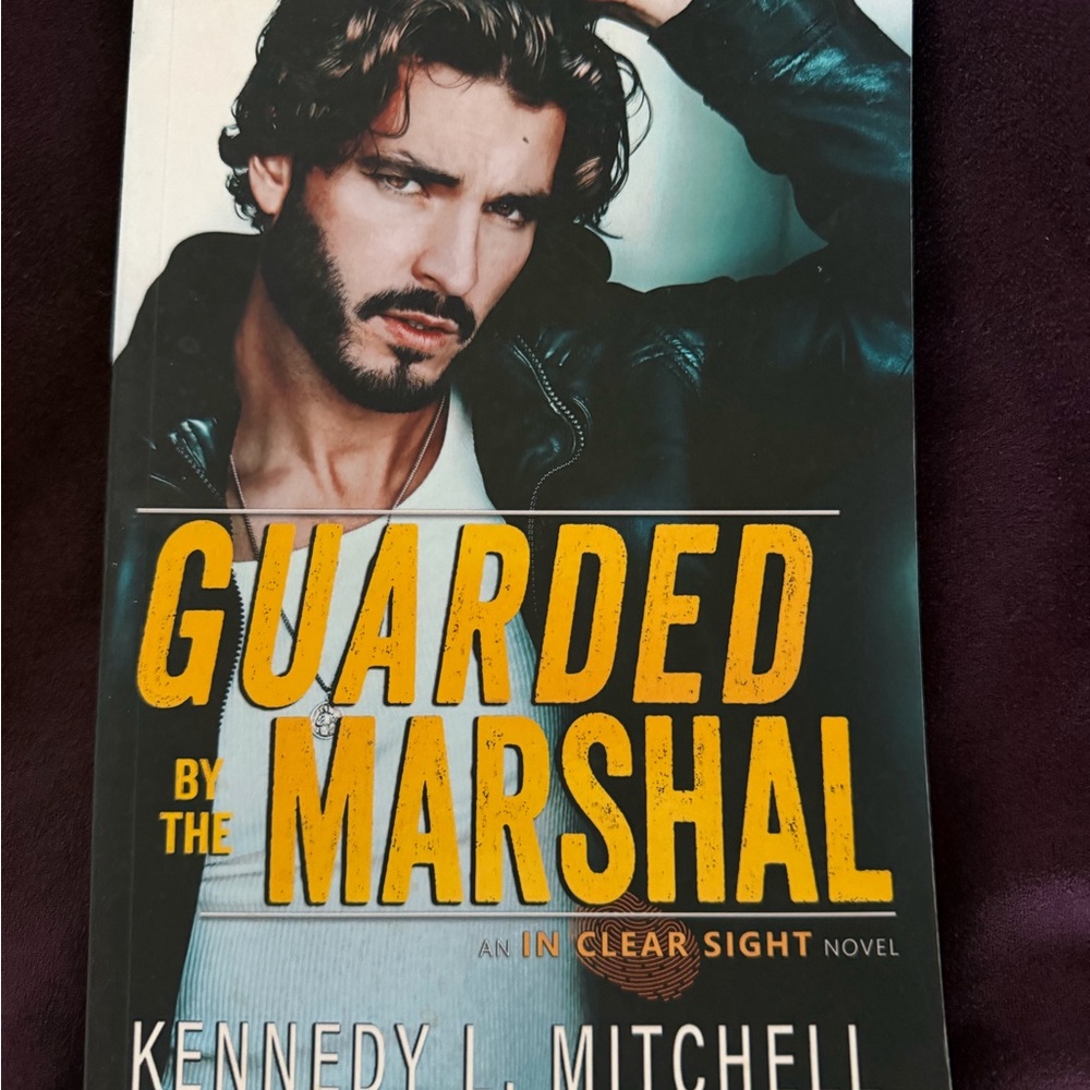 Guarded by the Marshal book by Kennedy L. Mitchell
